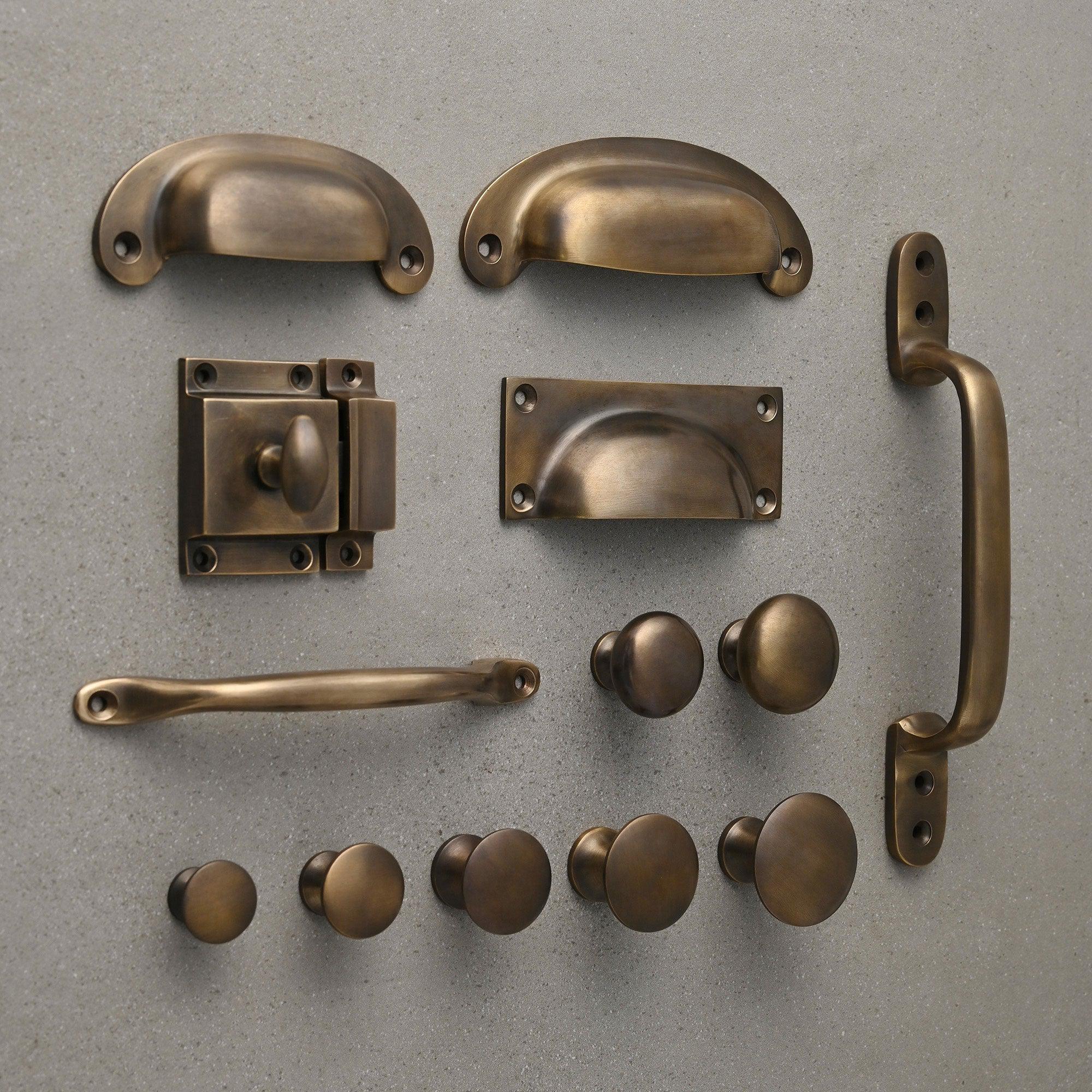 Cupboard Knobs On Decorative Backplate In Antique Brass, Door handles &  door accessories