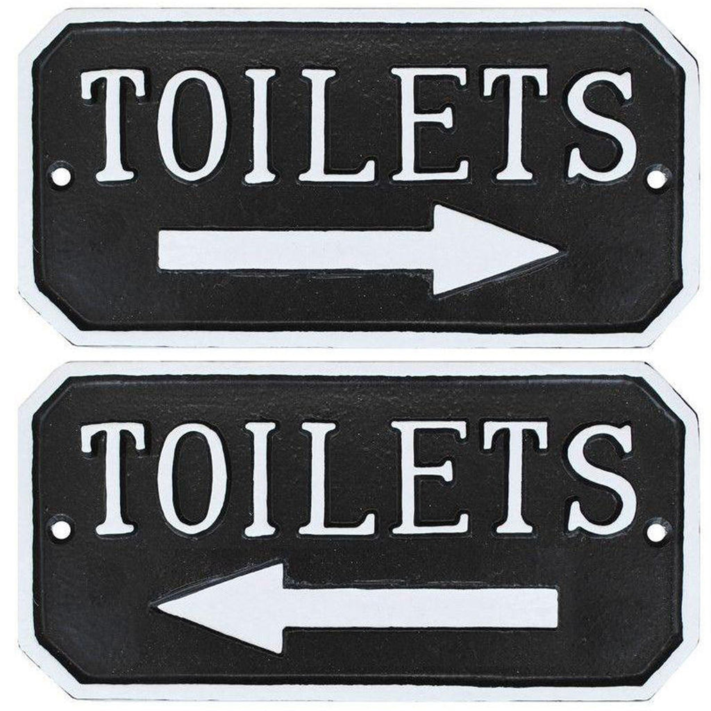 Toilets + Arrow Sign