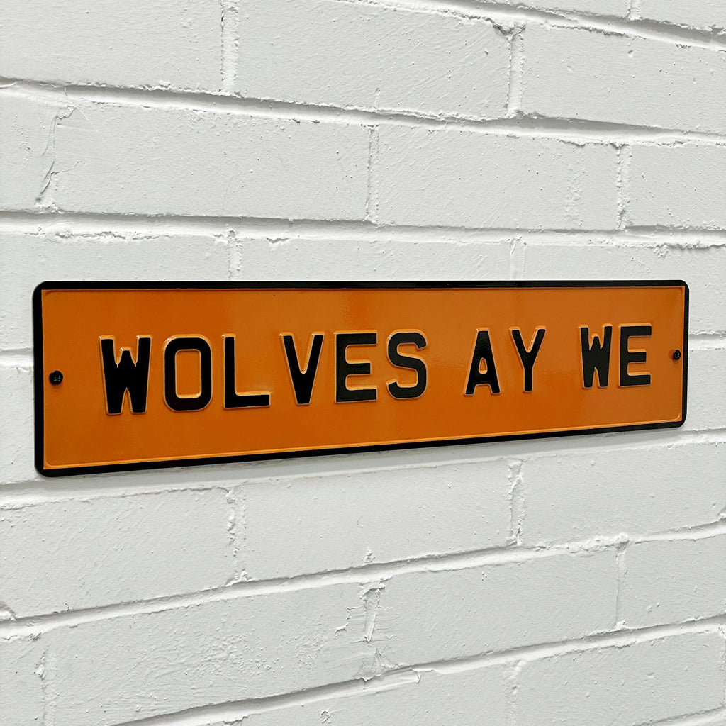Wolves Ay We Embossed Metal Sign